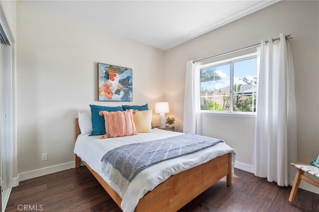 23906 Olson Ln, Lomita, CA 90717 - bedroom with baseboards and dark wood-style floors
