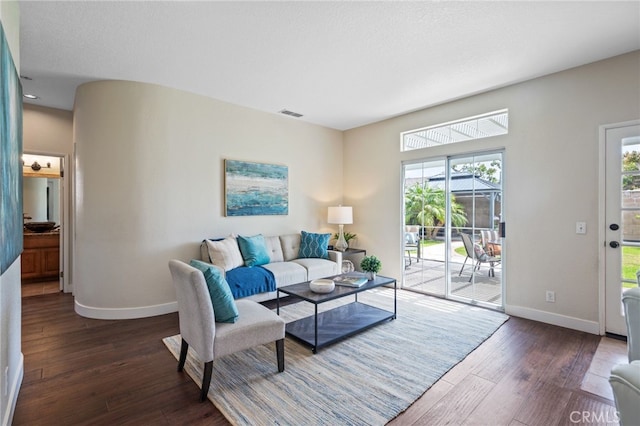 23906 Olson Ln, Lomita, CA 90717 - living area with wood-type flooring, baseboards, and recessed lighting