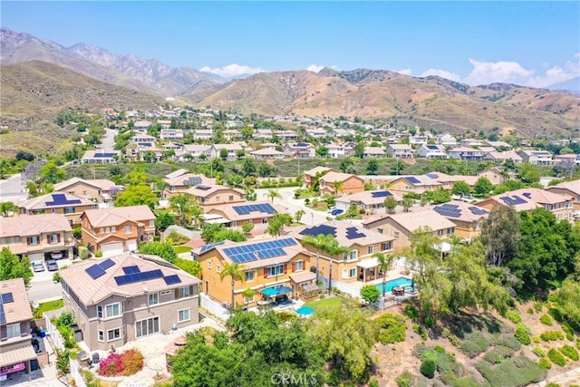 29207 Clear Spring Ln, Highland, CA 92346 - aerial perspective of suburban area with a pool and a mountain backdrop