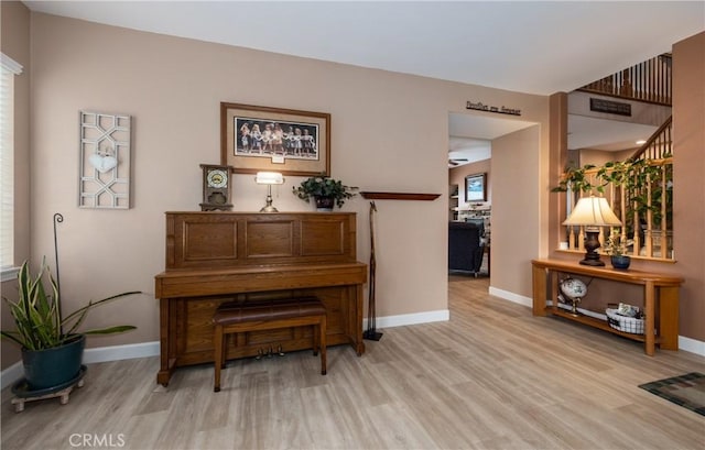 29207 Clear Spring Ln, Highland, CA 92346 - sitting room with wood finished floors and baseboards