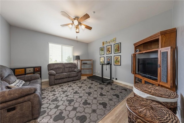 29207 Clear Spring Ln, Highland, CA 92346 - living area featuring wood finished floors, ceiling fan, and baseboards