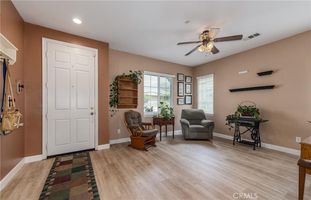 29207 Clear Spring Ln, Highland, CA 92346 - foyer entrance featuring light wood finished floors, baseboards, a ceiling fan, and recessed lighting