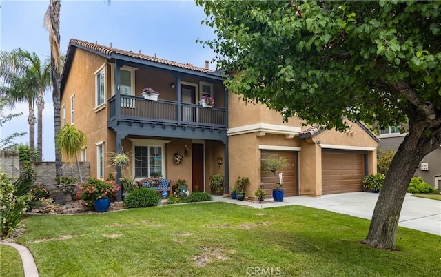 29207 Clear Spring Ln, Highland, CA 92346 - view of front facade with a balcony, stucco siding, concrete driveway, a garage, and a front yard