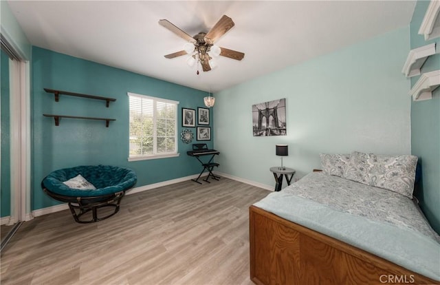 29207 Clear Spring Ln, Highland, CA 92346 - bedroom with light wood-type flooring, baseboards, and a ceiling fan