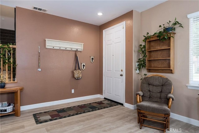 29207 Clear Spring Ln, Highland, CA 92346 - foyer entrance with wood finished floors, baseboards, and recessed lighting