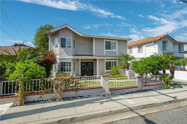 2013 Speyer Ln Unit A, Redondo Beach, CA 90278 - traditional-style house with stucco siding and a fenced front yard