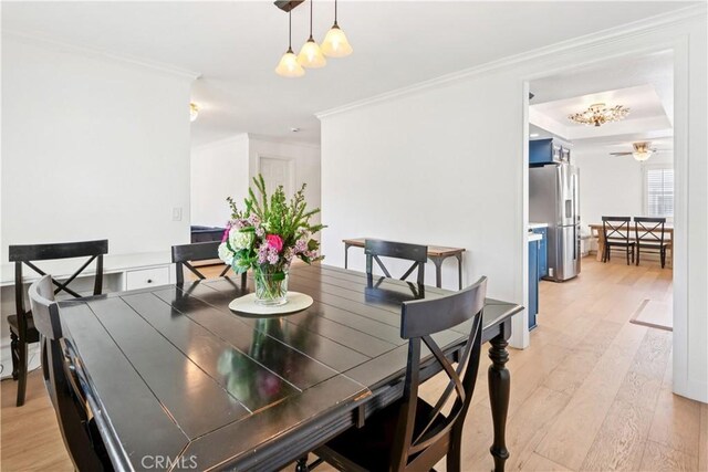2013 Speyer Ln Unit A, Redondo Beach, CA 90278 - dining area with ornamental molding, light wood-style floors, and a ceiling fan