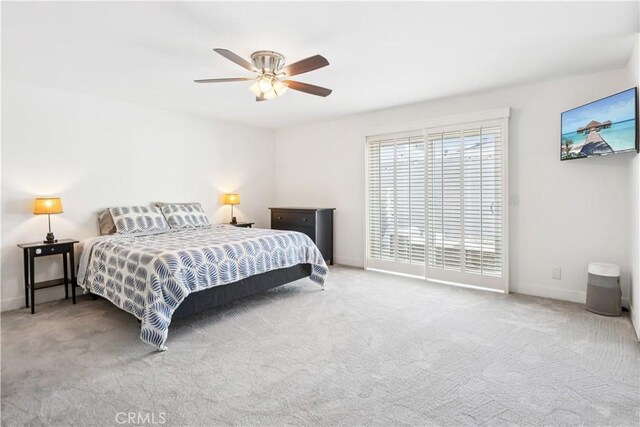 2013 Speyer Ln Unit A, Redondo Beach, CA 90278 - carpeted bedroom featuring access to exterior, baseboards, and a ceiling fan