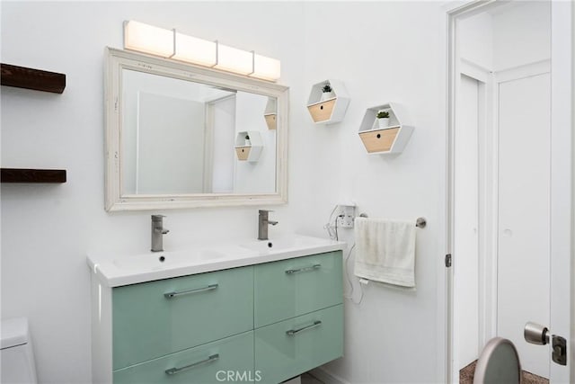 1675 W Lambert Rd Unit G, La Habra, CA 90631 - bathroom with double vanity and toilet