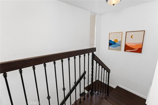 1675 W Lambert Rd Unit G, La Habra, CA 90631 - staircase featuring wood finished floors and baseboards
