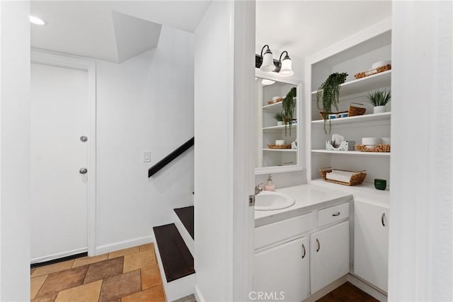 1675 W Lambert Rd Unit G, La Habra, CA 90631 - bathroom with vanity and stone finish floors