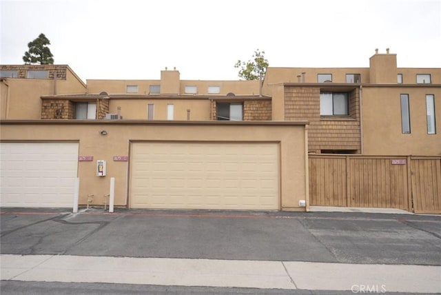 1675 W Lambert Rd Unit G, La Habra, CA 90631 - view of front of property featuring stucco siding