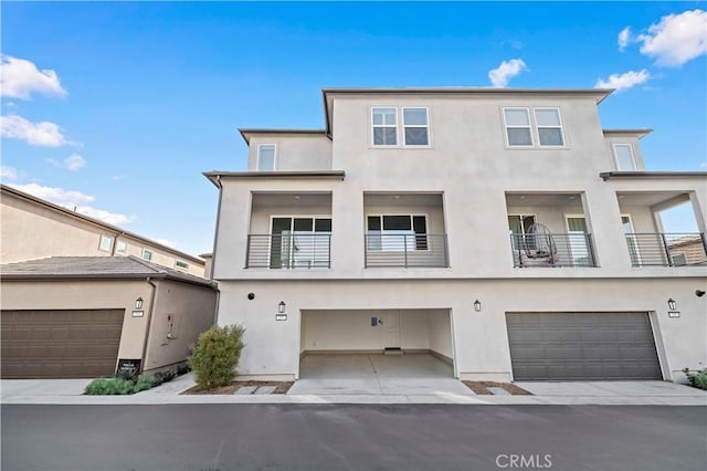 297 Lynx, Irvine, CA 92618 - view of front of home featuring stucco siding and an attached garage