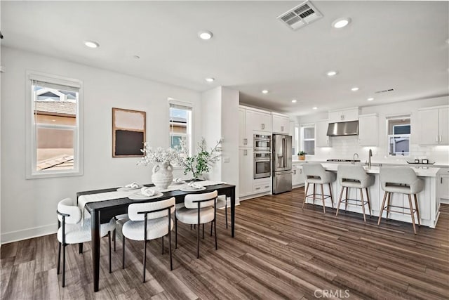 297 Lynx, Irvine, CA 92618 - dining area featuring plenty of natural light, dark wood-type flooring, and recessed lighting