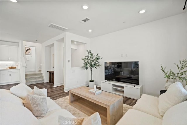 297 Lynx, Irvine, CA 92618 - living area with wood finished floors, recessed lighting, and stairs