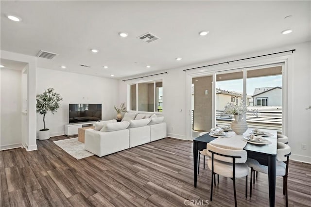 297 Lynx, Irvine, CA 92618 - living area with dark wood-style floors, plenty of natural light, and recessed lighting