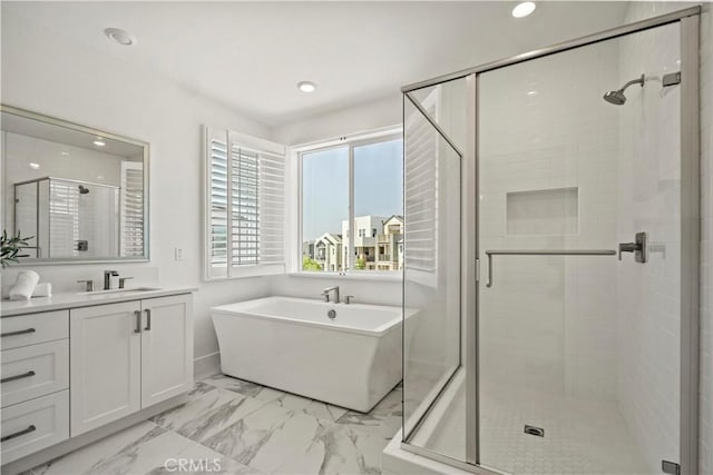 297 Lynx, Irvine, CA 92618 - full bath with a stall shower, vanity, marble look tile flooring, a freestanding tub, and recessed lighting