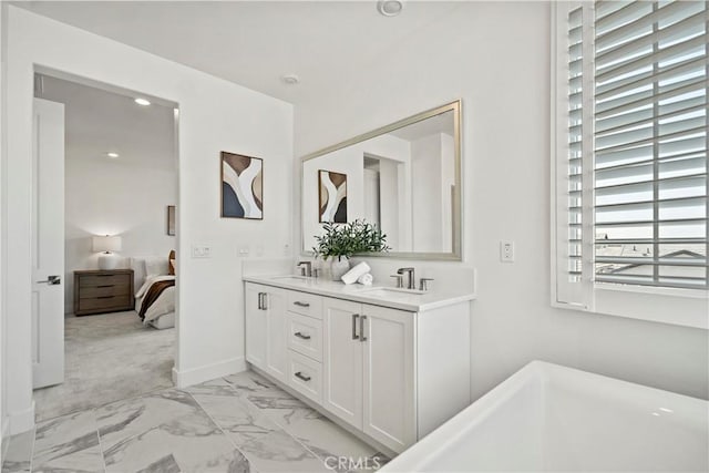 297 Lynx, Irvine, CA 92618 - ensuite bathroom with double vanity, a soaking tub, marble finish floors, and recessed lighting