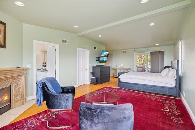 1606 Glenmont Dr, Glendale, CA 91207 - bedroom featuring a premium fireplace, baseboards, recessed lighting, wood finished floors, and connected bathroom