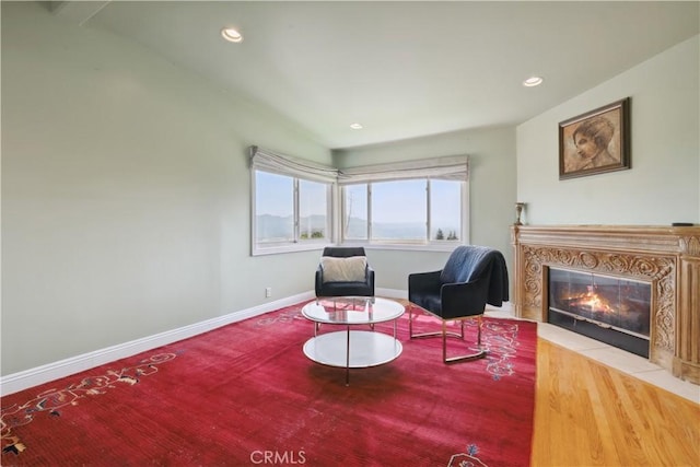 1606 Glenmont Dr, Glendale, CA 91207 - living area with healthy amount of natural light, baseboards, a high end fireplace, recessed lighting, and wood finished floors