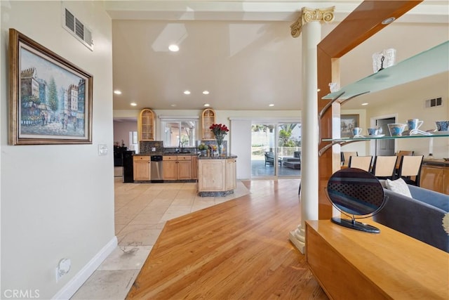 1606 Glenmont Dr, Glendale, CA 91207 - kitchen featuring dishwasher, dark countertops, open floor plan, glass insert cabinets, and recessed lighting