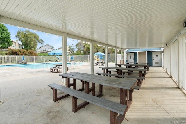 655 Boysenberry Way, Oceanside, CA 92057 - fenced backyard with a community pool and a patio area