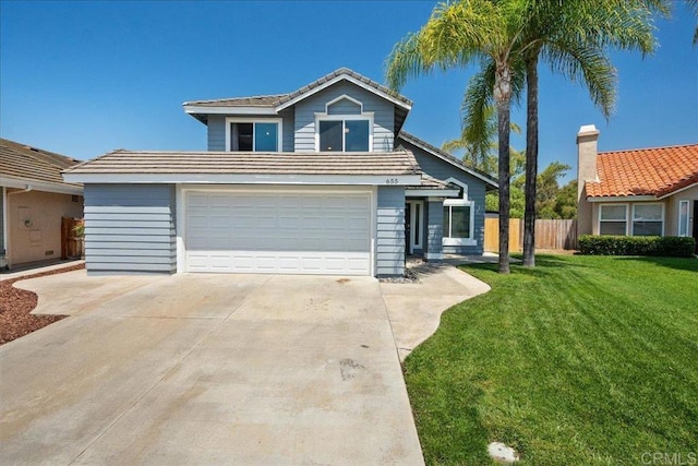 655 Boysenberry Way, Oceanside, CA 92057 - traditional-style home with concrete driveway, a garage, and a tiled roof