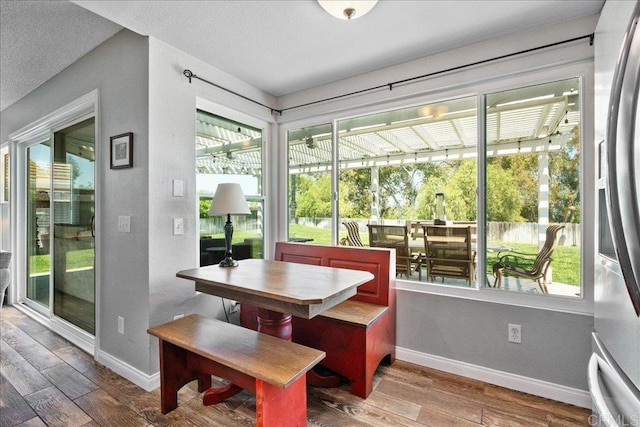 655 Boysenberry Way, Oceanside, CA 92057 - sunroom with wood finished floors and a textured ceiling