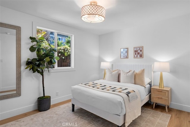 3830 Cedar Ave, Long Beach, CA 90807 - bedroom featuring wood finished floors and baseboards