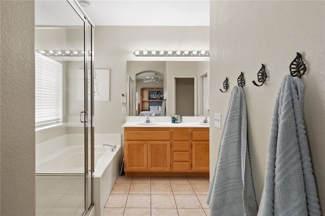 32839 Charmes Ct, Temecula, CA 92592 - bathroom with a shower stall, a garden tub, tile patterned floors, and double vanity