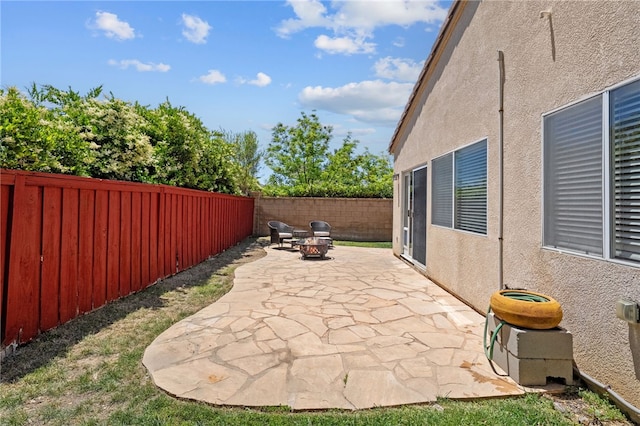 32839 Charmes Ct, Temecula, CA 92592 - fenced backyard featuring a fire pit and a patio