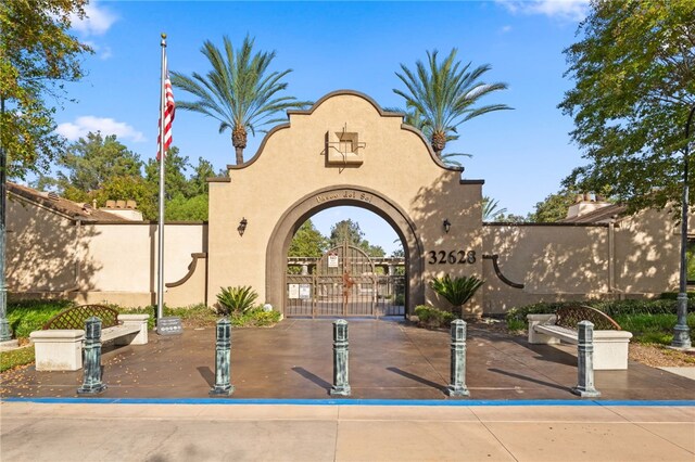 32839 Charmes Ct, Temecula, CA 92592 - community / neighborhood sign featuring a gate