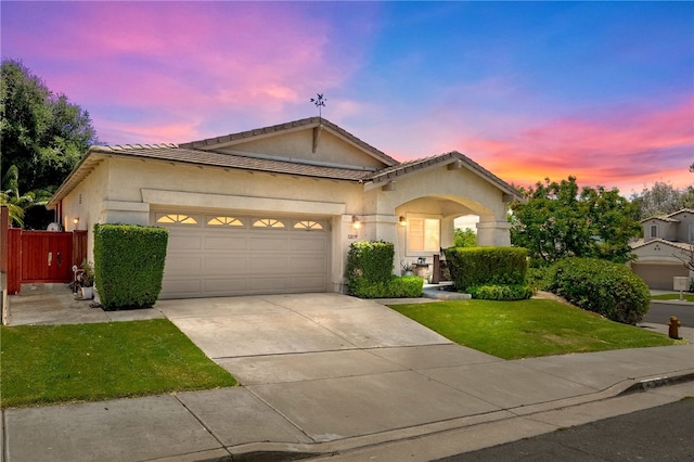 32839 Charmes Ct, Temecula, CA 92592 - view of front of property featuring an attached garage, concrete driveway, a tiled roof, and stucco siding