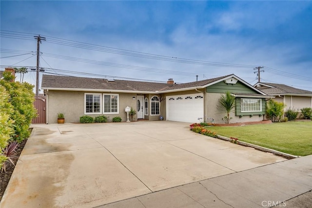5202 Caliente Dr, Huntington Beach, CA 92649 - ranch-style home featuring stucco siding, a garage, concrete driveway, and a front lawn