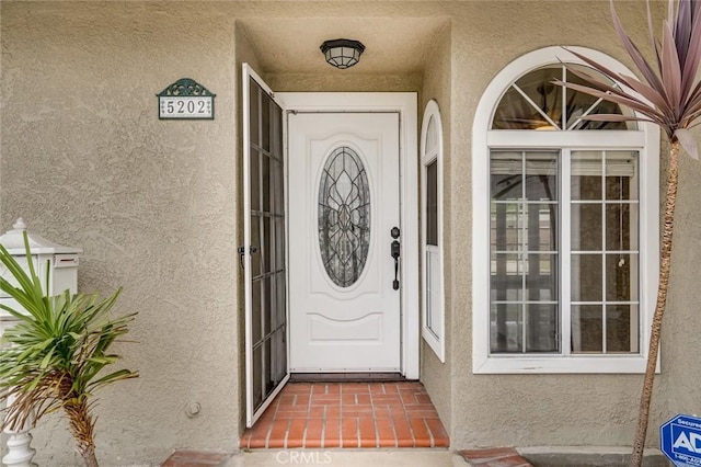 5202 Caliente Dr, Huntington Beach, CA 92649 - property entrance with stucco siding