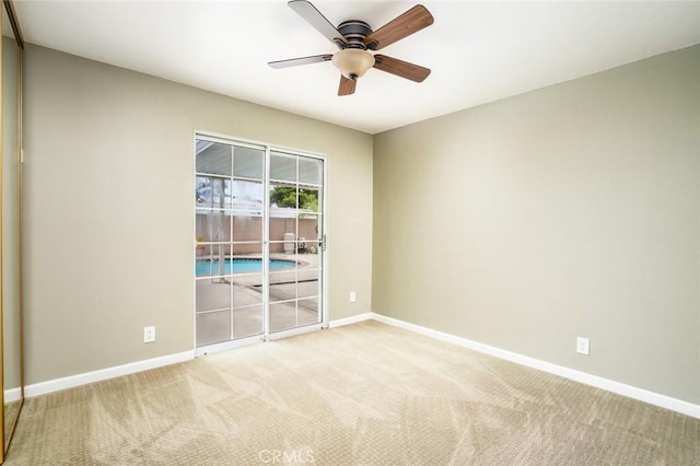 5202 Caliente Dr, Huntington Beach, CA 92649 - carpeted spare room with baseboards and ceiling fan