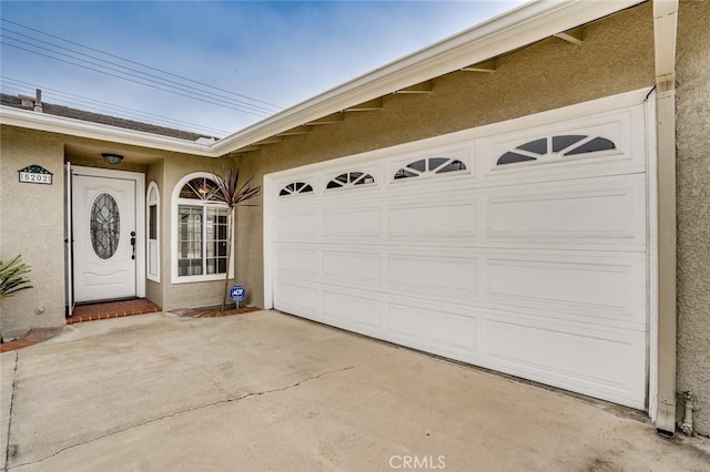 5202 Caliente Dr, Huntington Beach, CA 92649 - garage with concrete driveway