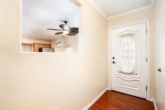 5202 Caliente Dr, Huntington Beach, CA 92649 - doorway with a ceiling fan, ornamental molding, baseboards, and wood finished floors
