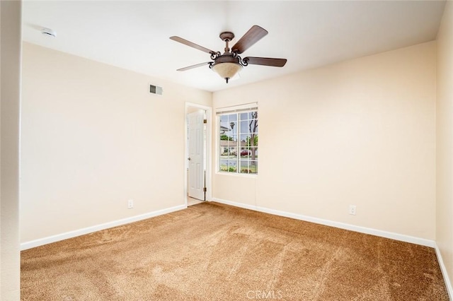 5202 Caliente Dr, Huntington Beach, CA 92649 - carpeted spare room featuring baseboards and a ceiling fan