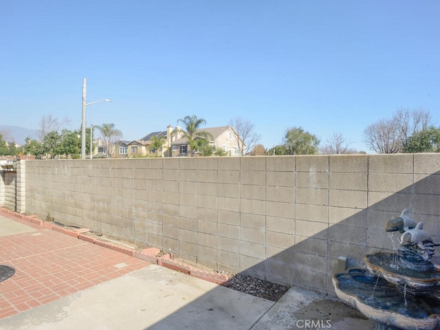 8619 San Miguel Pl, Rancho Cucamonga, CA 91730 - fenced backyard featuring a patio area