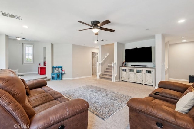 5460 Turin Way, Fontana, CA 92336 - living room with a ceiling fan, stairway, light colored carpet, and recessed lighting