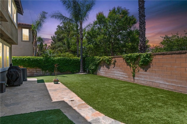 5460 Turin Way, Fontana, CA 92336 - fenced backyard featuring a patio area