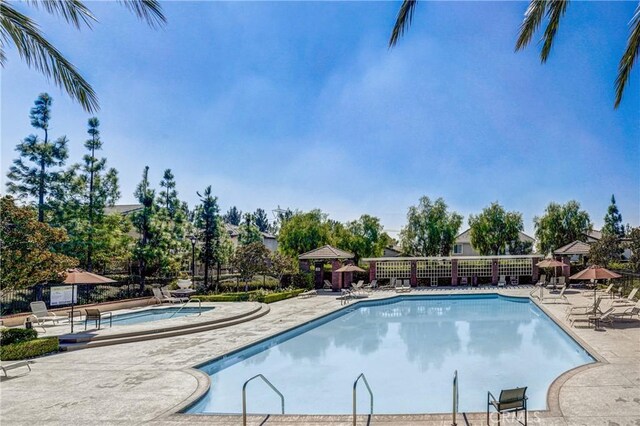 5460 Turin Way, Fontana, CA 92336 - community pool with a patio area