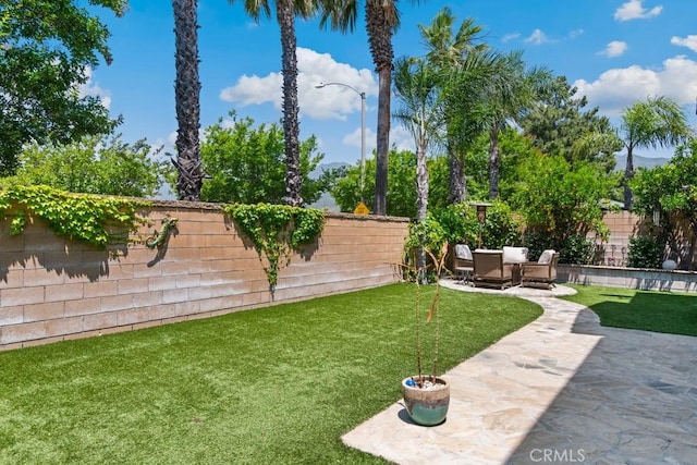 5460 Turin Way, Fontana, CA 92336 - fenced backyard featuring a patio