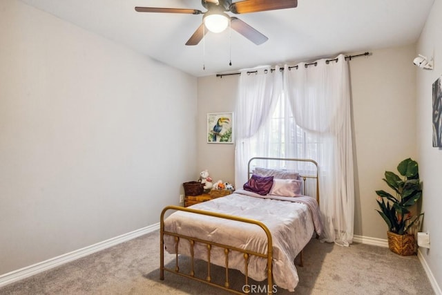 5460 Turin Way, Fontana, CA 92336 - carpeted bedroom featuring baseboards and a ceiling fan