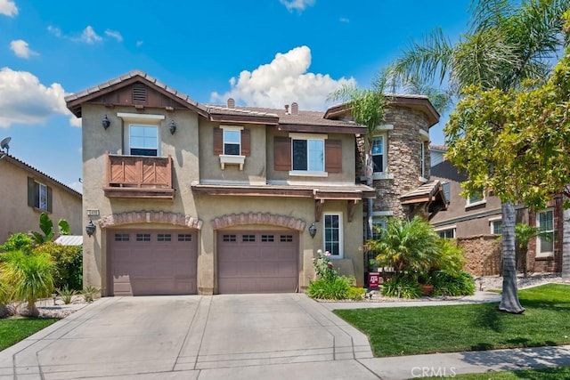 5460 Turin Way, Fontana, CA 92336 - view of front facade with a balcony, concrete driveway, stucco siding, and a garage
