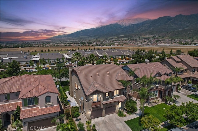 5460 Turin Way, Fontana, CA 92336 - aerial view at dusk of a residential view and a mountain view