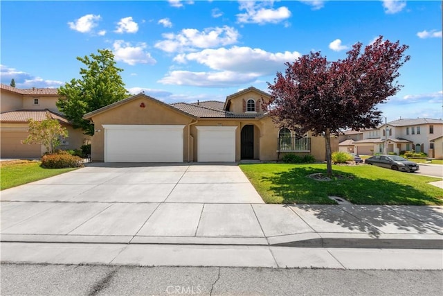 40744 W Palmwood Ct, Palmdale, CA 93551 - mediterranean / spanish house with a garage, stucco siding, driveway, a front yard, and a tiled roof