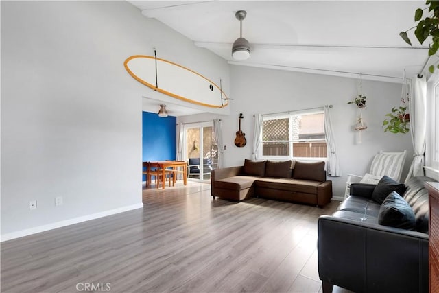 26422 Paseo Carmel Unit 20A, San Juan Capistrano, CA 92675 - living room featuring healthy amount of natural light, wood finished floors, and baseboards