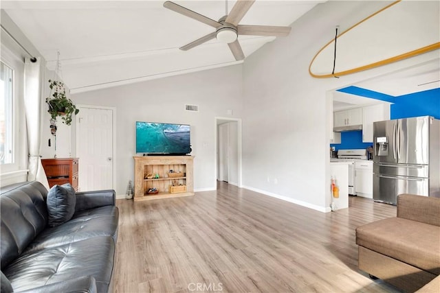 26422 Paseo Carmel Unit 20A, San Juan Capistrano, CA 92675 - living room with light wood-type flooring, a ceiling fan, baseboards, high vaulted ceiling, and beamed ceiling